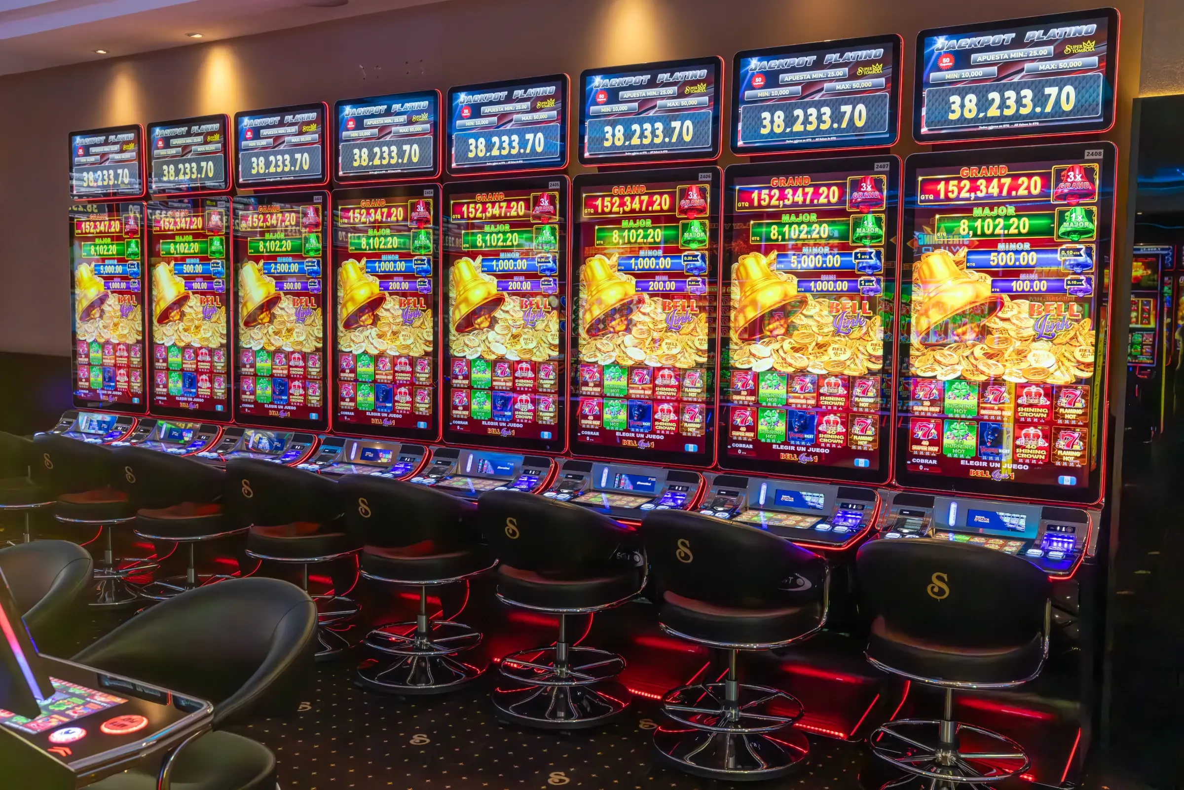 Jackpot displays above a machine bank, Guatemala