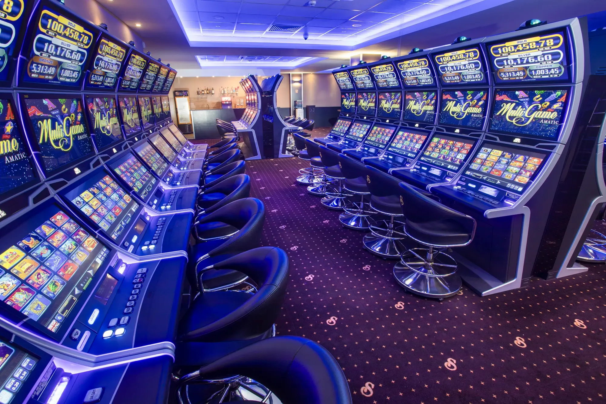 A long row of slot machines on the Senator Club floor, Mauritius